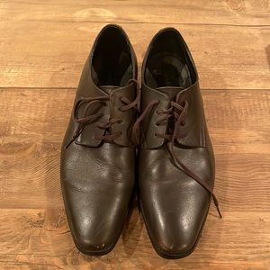 Very gently used.  My husband leans towards black shoes over brown